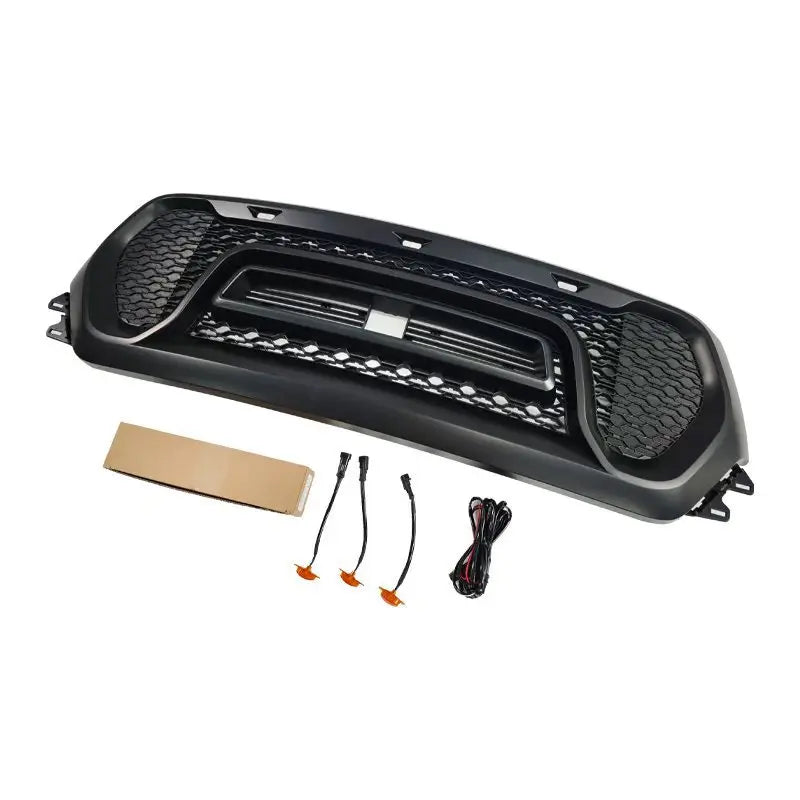 Dodge RAM 1500 – Grid Style Frontgrill Hochglanz Schwarz mit 3 orangen LEDs